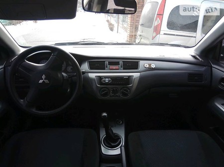 Mitsubishi Lancer 2009  випуску Запоріжжя з двигуном 1.6 л бензин седан механіка за 6500 долл. 