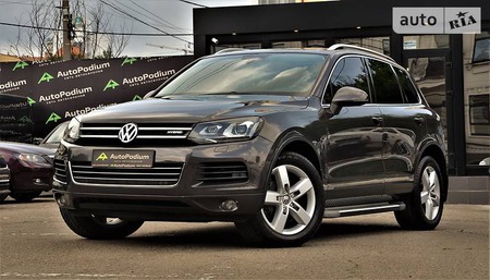 Volkswagen Touareg 2012  випуску Київ з двигуном 3 л гібрид позашляховик автомат за 26500 долл. 