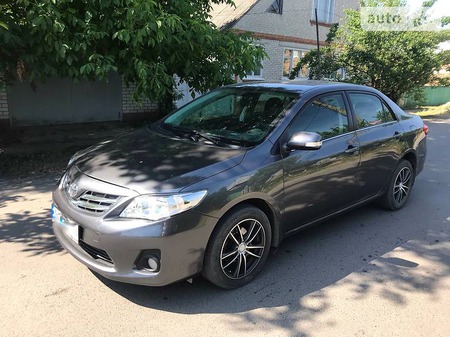 Toyota Corolla 2011  випуску Харків з двигуном 1.6 л газ седан автомат за 11100 долл. 