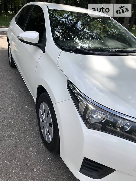 Toyota Corolla 2014  випуску Харків з двигуном 1.3 л газ седан механіка за 11500 долл. 