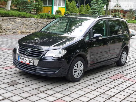 Volkswagen Touran 2009  випуску Тернопіль з двигуном 1.4 л бензин мінівен механіка за 7950 долл. 