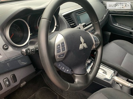 Mitsubishi Lancer 2014  випуску Київ з двигуном 2.4 л газ седан автомат за 10999 долл. 