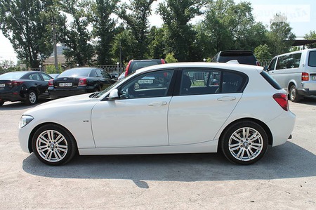 BMW 116 2012  випуску Харків з двигуном 1.6 л бензин хэтчбек автомат за 14300 долл. 