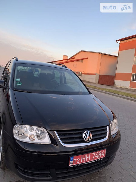 Volkswagen Touran 2006  випуску Львів з двигуном 1.4 л бензин мінівен механіка за 6300 долл. 