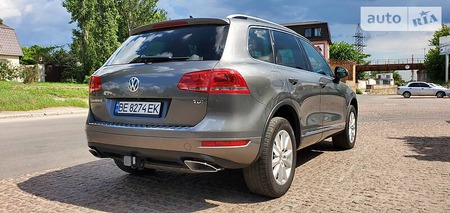 Volkswagen Touareg 2014  випуску Миколаїв з двигуном 3 л дизель позашляховик автомат за 25400 долл. 