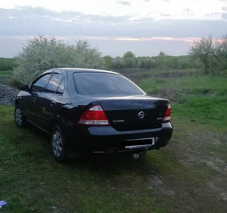 Nissan Almera 2008  випуску Суми з двигуном 1.6 л  седан механіка за 5300 долл. 