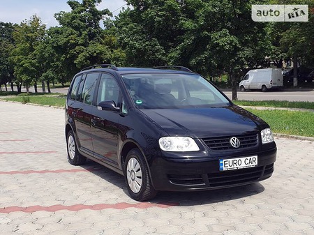 Volkswagen Touran 2004  випуску Дніпро з двигуном 0 л бензин мінівен механіка за 6999 долл. 