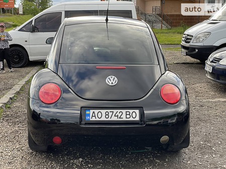 Volkswagen New Beetle 1999  випуску Ужгород з двигуном 2 л бензин купе механіка за 4150 долл. 