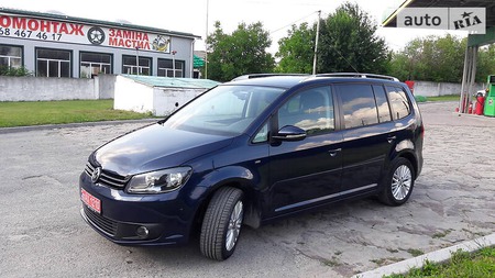 Volkswagen Touran 2014  випуску Тернопіль з двигуном 1.6 л дизель мінівен механіка за 12999 долл. 