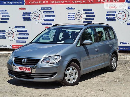 Volkswagen Touran 2010  випуску Дніпро з двигуном 1.4 л бензин мінівен автомат за 9150 долл. 