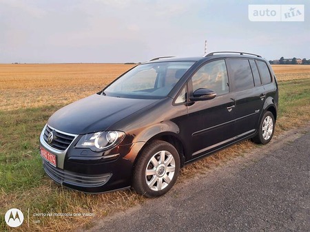 Volkswagen Touran 2009  випуску Львів з двигуном 1.4 л бензин мінівен автомат за 7500 долл. 