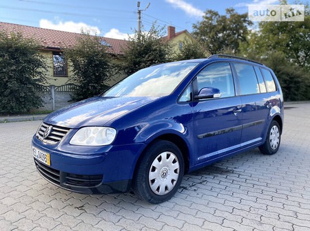 Volkswagen Touran 2004  випуску Львів з двигуном 1.4 л бензин мінівен механіка за 6700 долл. 