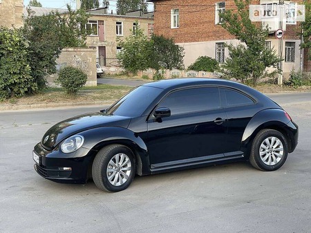 Volkswagen Beetle 2014  випуску Харків з двигуном 1.8 л бензин купе автомат за 10700 долл. 