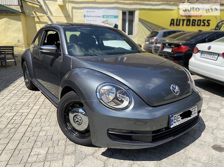 Volkswagen New Beetle 2014  випуску Миколаїв з двигуном 1.8 л бензин купе автомат за 9300 долл. 