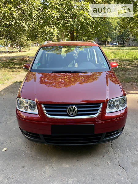 Volkswagen Touran 2005  випуску Одеса з двигуном 2 л бензин хэтчбек автомат за 7300 долл. 