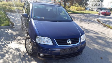 Volkswagen Touran 2006  випуску Одеса з двигуном 0 л бензин універсал механіка за 6500 долл. 