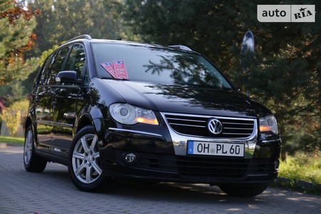 Volkswagen Touran 2008  випуску Львів з двигуном 1.4 л бензин мінівен автомат за 7950 долл. 