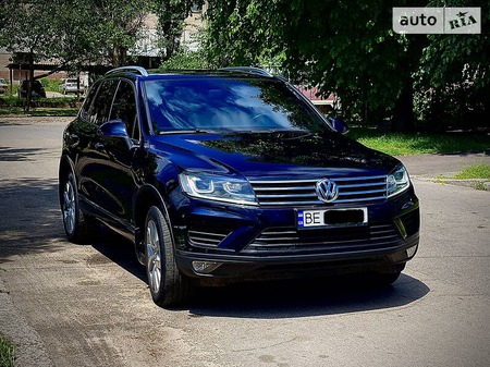 Volkswagen Touareg 2014  випуску Миколаїв з двигуном 3 л дизель позашляховик автомат за 29500 долл. 