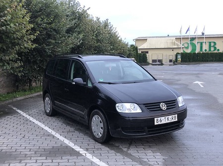 Volkswagen Touran 2006  випуску Львів з двигуном 1.6 л бензин мінівен механіка за 5999 долл. 