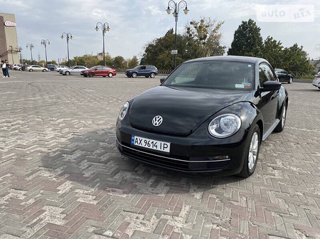 Volkswagen Beetle 2014  випуску Харків з двигуном 1.8 л бензин хэтчбек автомат за 9500 долл. 