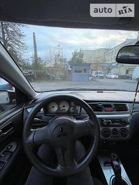 Mitsubishi Lancer 2006  випуску Львів з двигуном 1.6 л бензин седан механіка за 5550 долл. 