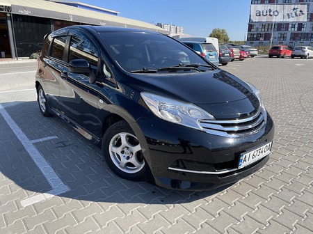 Nissan Note 2013  випуску Київ з двигуном 1.2 л бензин хэтчбек автомат за 8500 долл. 