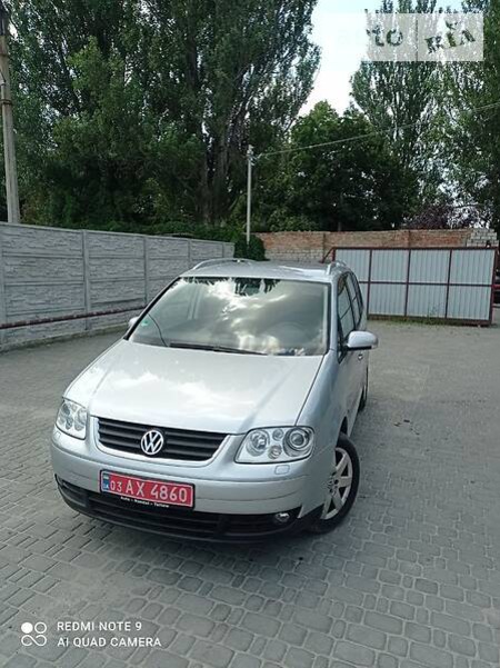 Volkswagen Touran 2006  випуску Запоріжжя з двигуном 1.4 л бензин універсал механіка за 6500 долл. 