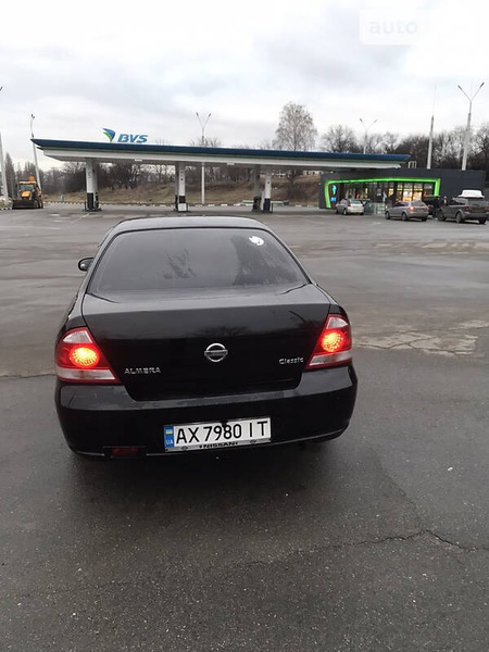 Nissan Almera 2010  випуску Харків з двигуном 1.6 л  седан механіка за 6200 долл. 