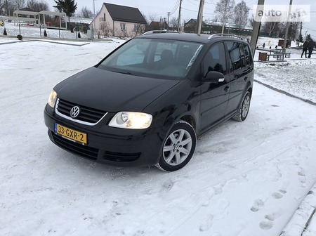 Volkswagen Touran 2005  випуску Львів з двигуном 1.6 л бензин мінівен механіка за 6850 долл. 