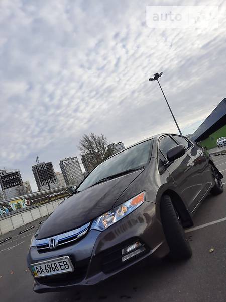 Honda Insight 2014  випуску Київ з двигуном 1.3 л гібрид ліфтбек автомат за 9999 долл. 
