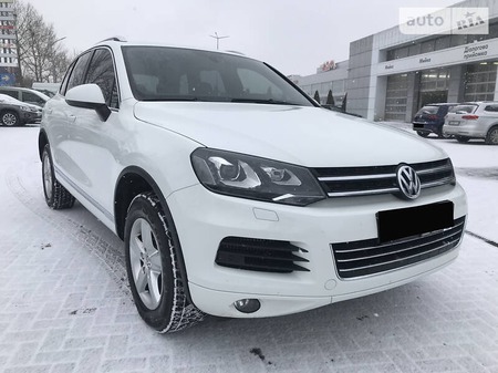 Volkswagen Touareg 2014  випуску Миколаїв з двигуном 3 л дизель позашляховик автомат за 23990 долл. 