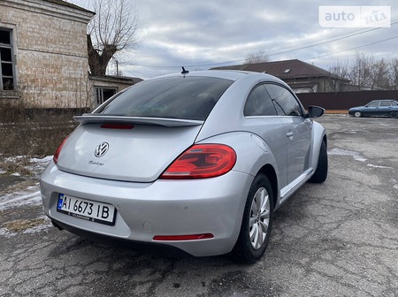 Volkswagen Beetle 2013  випуску Київ з двигуном 1.4 л бензин хэтчбек автомат за 12300 долл. 