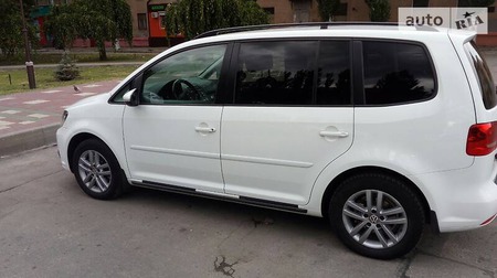 Volkswagen Touran 2014  випуску Запоріжжя з двигуном 1.4 л  мінівен автомат за 11600 долл. 