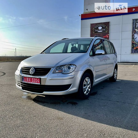 Volkswagen Touran 2008  випуску Херсон з двигуном 1.4 л  універсал механіка за 7399 долл. 