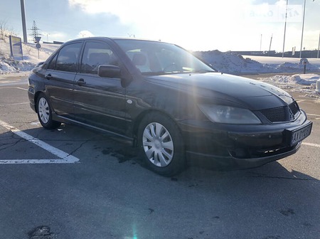 Mitsubishi Lancer 2004  випуску Харків з двигуном 2 л бензин седан механіка за 5300 долл. 