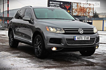 Volkswagen Touareg 2011  випуску Черкаси з двигуном 3 л дизель позашляховик автомат за 21999 долл. 