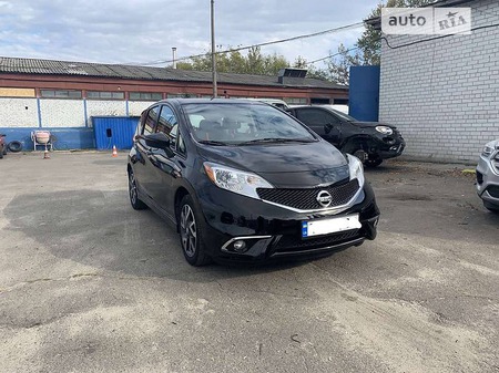 Nissan Note 2014  випуску Донецьк з двигуном 1.6 л  хэтчбек автомат за 9700 долл. 