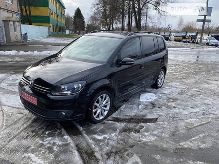 Volkswagen Touran 2014  випуску Луцьк з двигуном 1.6 л дизель універсал автомат за 12300 долл. 