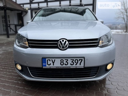 Volkswagen Touran 2013  випуску Тернопіль з двигуном 1.6 л дизель універсал автомат за 11500 долл. 