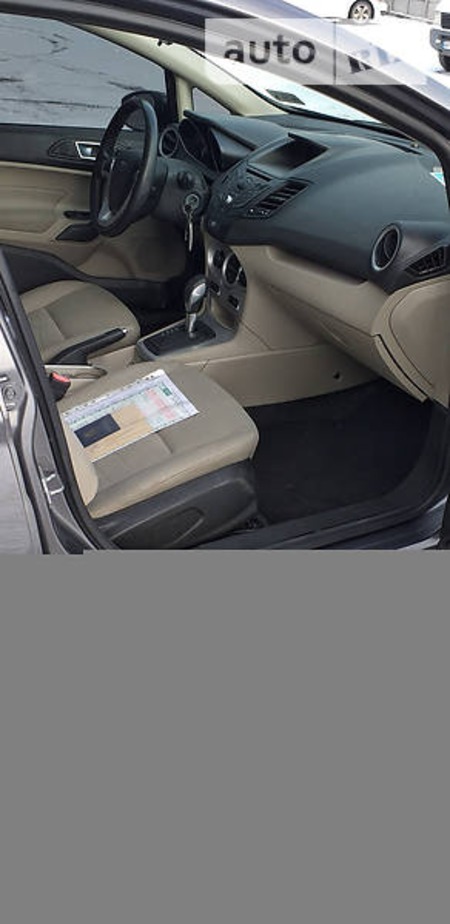 Ford Fiesta 2014  випуску Запоріжжя з двигуном 1.6 л бензин седан автомат за 7500 долл. 