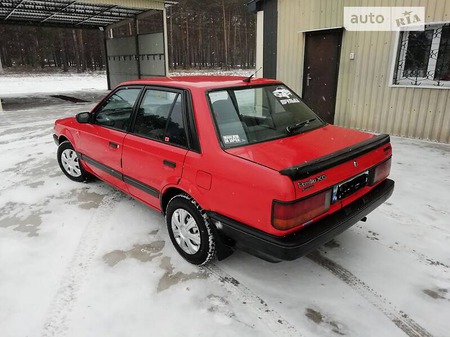 Mazda 323 1985  випуску Хмельницький з двигуном 1.5 л бензин седан механіка за 1350 долл. 