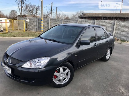 Mitsubishi Lancer 2003  випуску Черкаси з двигуном 1.6 л  седан механіка за 3950 долл. 