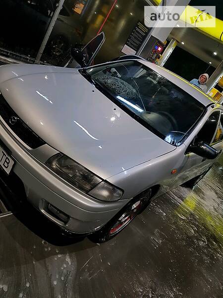 Mazda 323 1997  випуску Київ з двигуном 1.5 л бензин седан механіка за 3100 долл. 