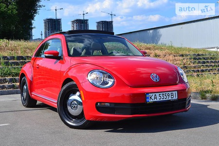 Volkswagen Beetle 2014  випуску Київ з двигуном 1.8 л бензин хэтчбек автомат за 11000 долл. 