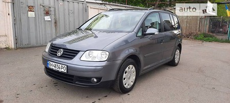 Volkswagen Touran 2006  випуску Одеса з двигуном 0 л бензин мінівен механіка за 5800 долл. 