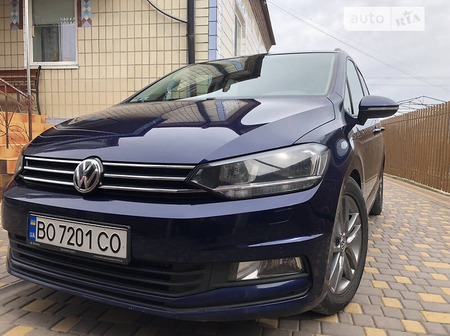 Volkswagen Touran 2016  випуску Тернопіль з двигуном 2 л дизель мінівен автомат за 17200 долл. 