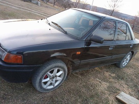 Mazda 323 1992  випуску Івано-Франківськ з двигуном 1.7 л дизель седан механіка за 1499 долл. 