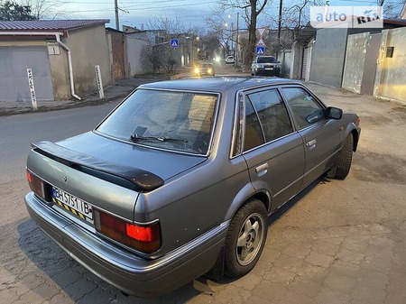 Mazda 323 1987  випуску Одеса з двигуном 1.5 л бензин седан механіка за 1350 долл. 