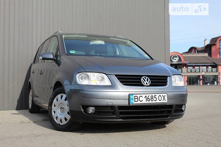Volkswagen Touran 2004  випуску Львів з двигуном 0 л бензин мінівен механіка за 6499 долл. 