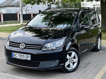 Volkswagen Touran 2011  випуску Львів з двигуном 1.6 л дизель мінівен механіка за 10195 долл. 